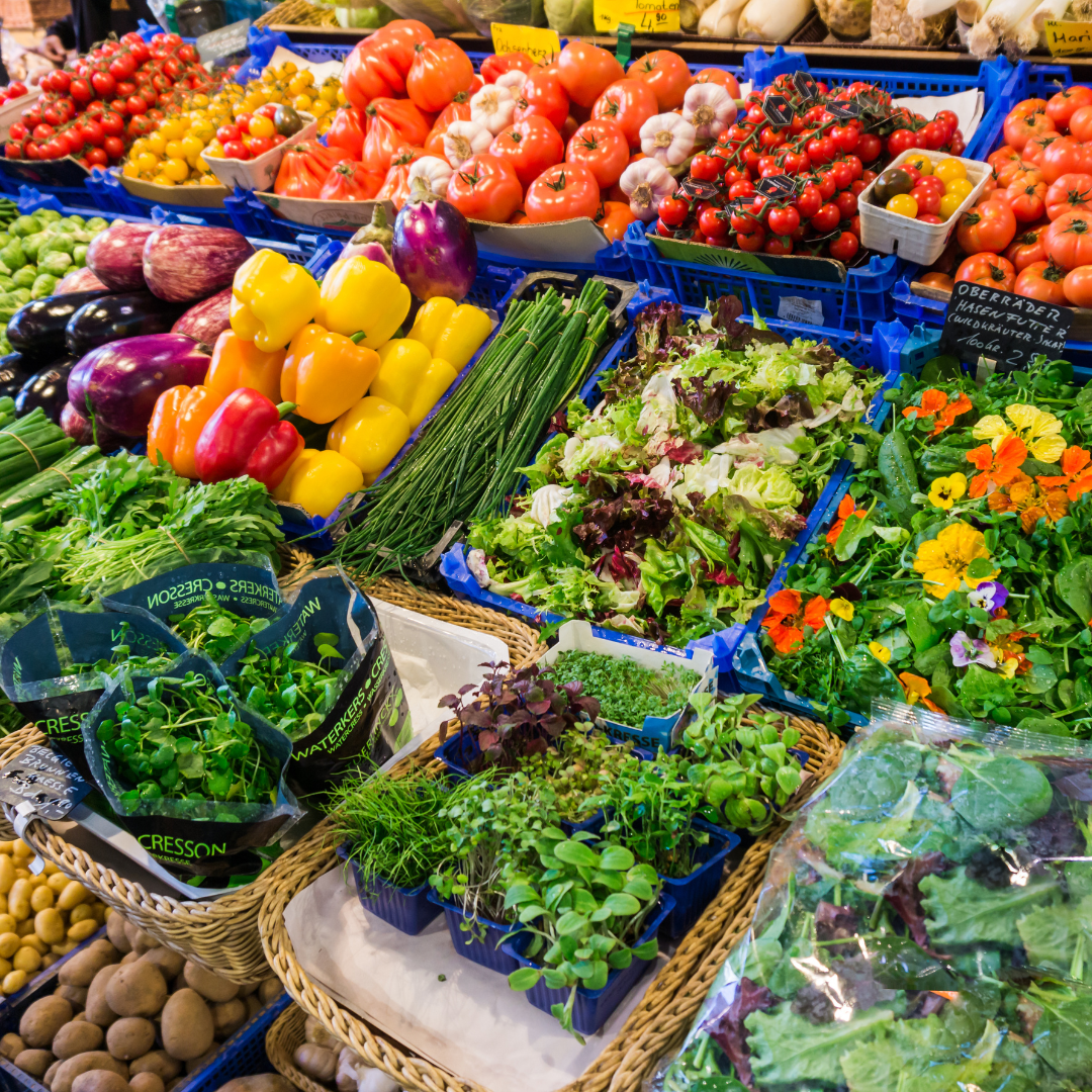 Step outside and thrive Produce stand.